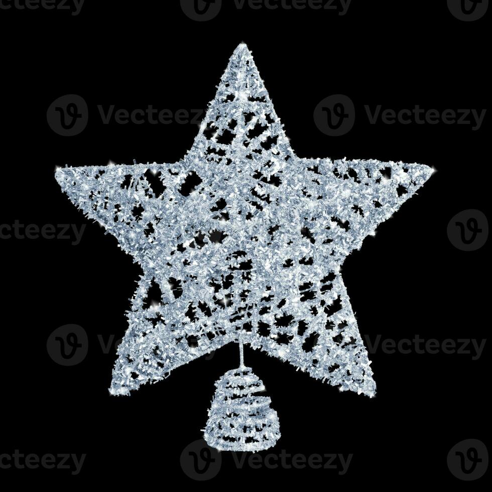 Silver star isolated on a black background. Christmas tree topper. Stock photo