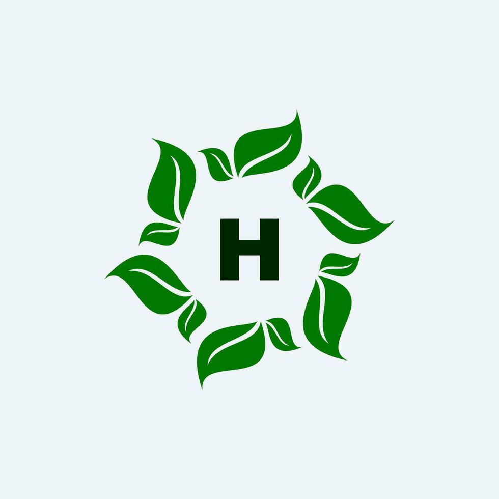 hoja y letra h logo diseño vector