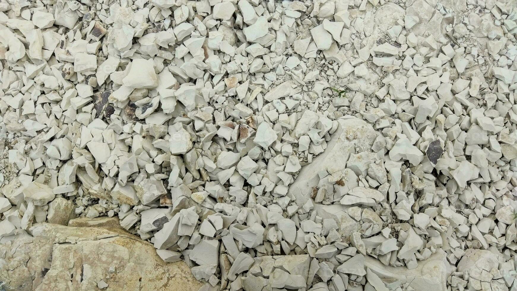 Shards white limestone rock texture details real photo for background