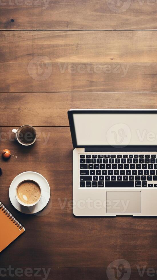 Neatly arranged workspace with a modern laptop and stationary, offering abundant copy space photo