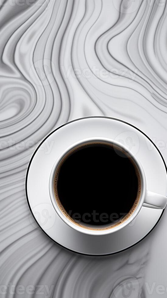 Aerial View of Steaming Coffee Cup on Geometrically Patterned Surface with Ample Copy Space photo