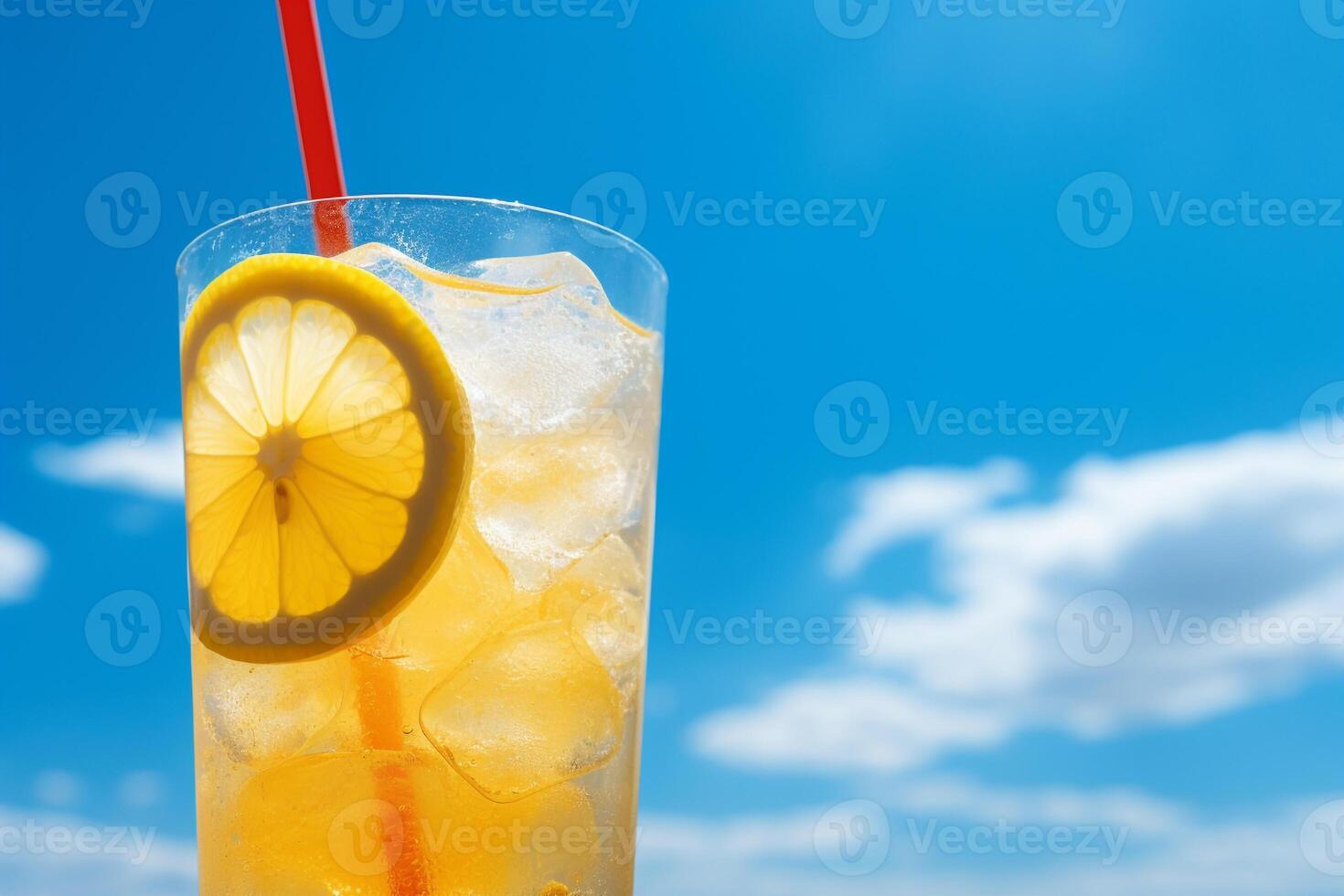 Bright Summer Image of Iced Lemonade in Glass with Lemon Slice and Straw photo