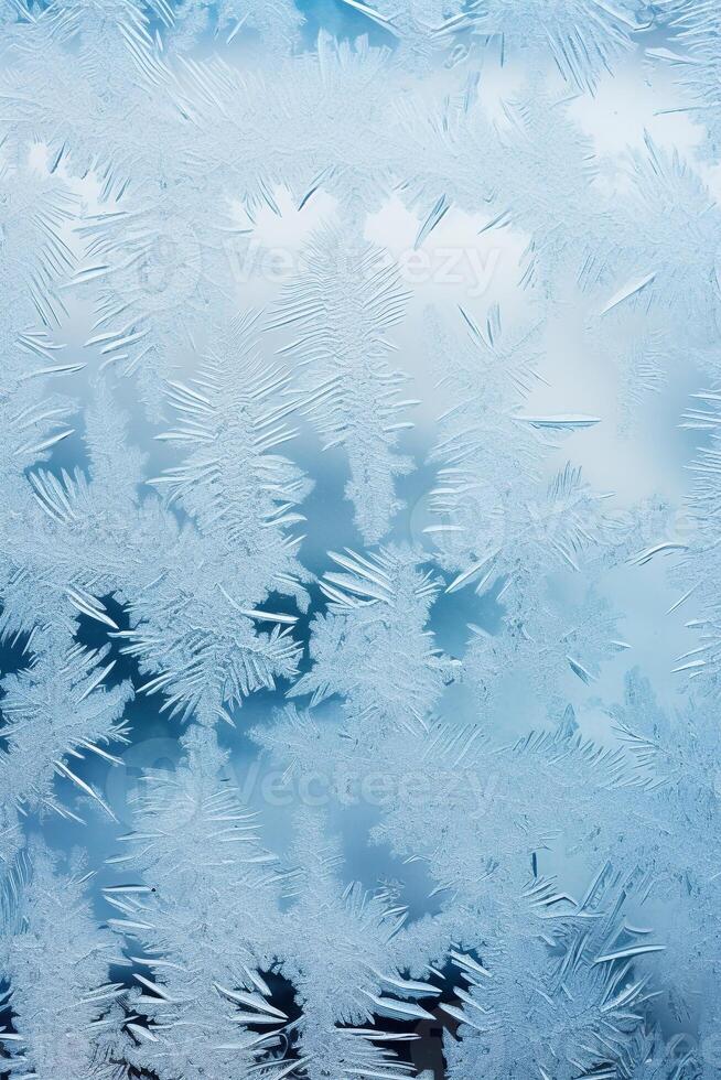 Frost Patterns on a Window Depicting Ice Crystals, Conveying a Winter Feel, Perfect for Holiday Greetings photo