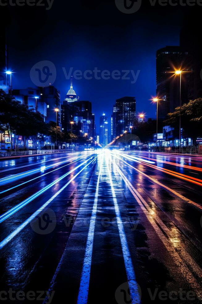 Blue car lights are seen at night due to a long exposure photo