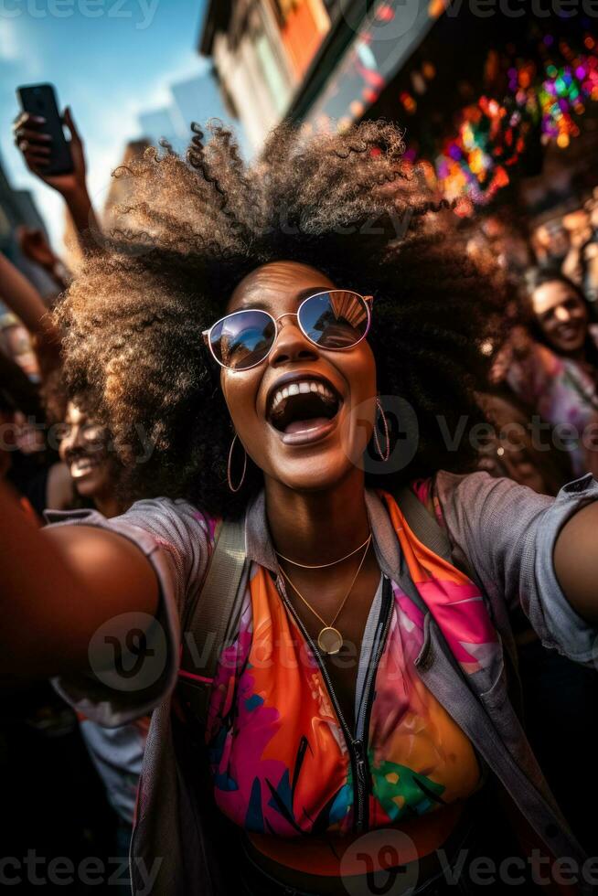 African American woman with afro crowd surfing fans at concert holding iPhones in colorful outfits and cool sunglasses photo