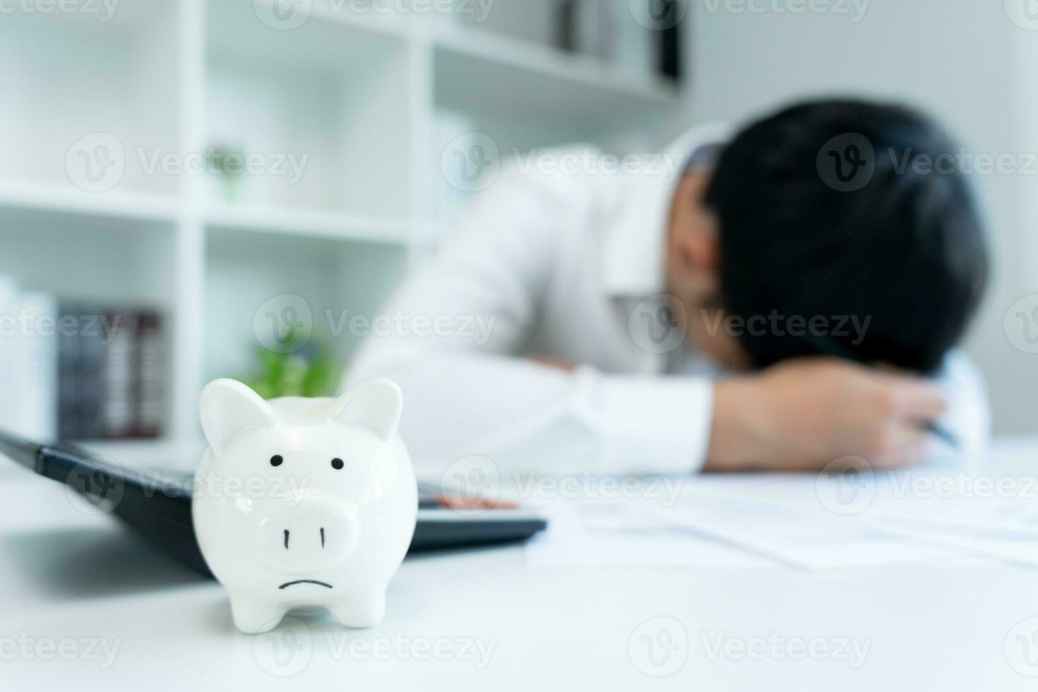 Stressed and headache man with large bills or invoices no money to pay to expenses and credit card debt. shortage, Financial problem, bankruptcy, mortgage, loan, bankrupt, poor, empty wallet photo