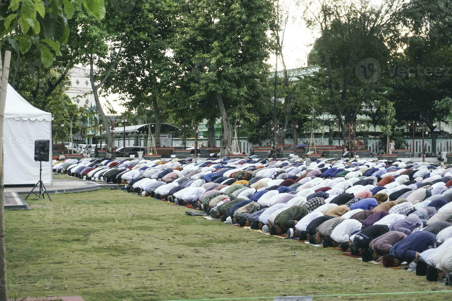 A photo of Muslim congregation praying Eid al-Adha in the field