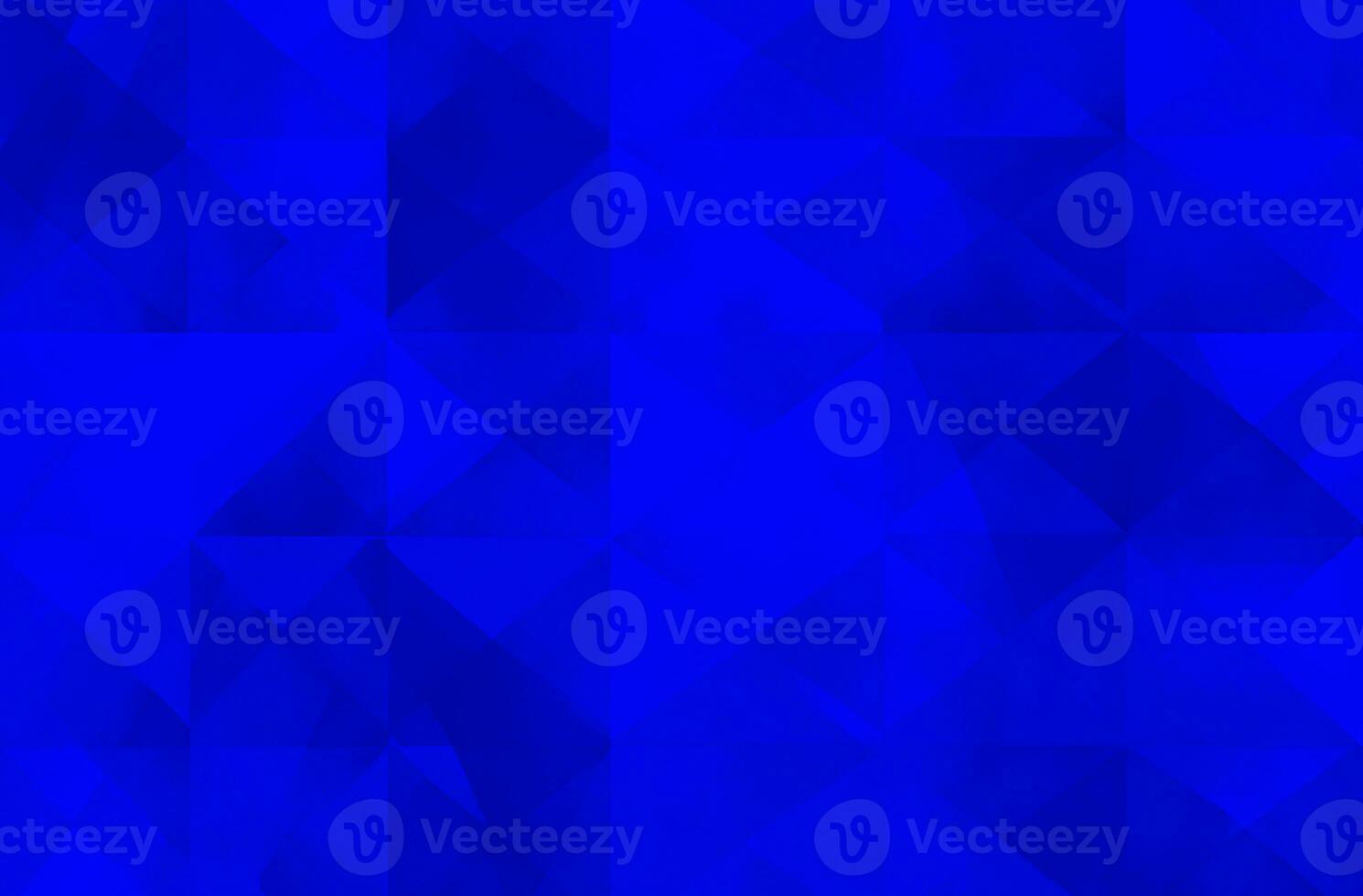 Abstract geometric pattern in blue triangle shapes background photo