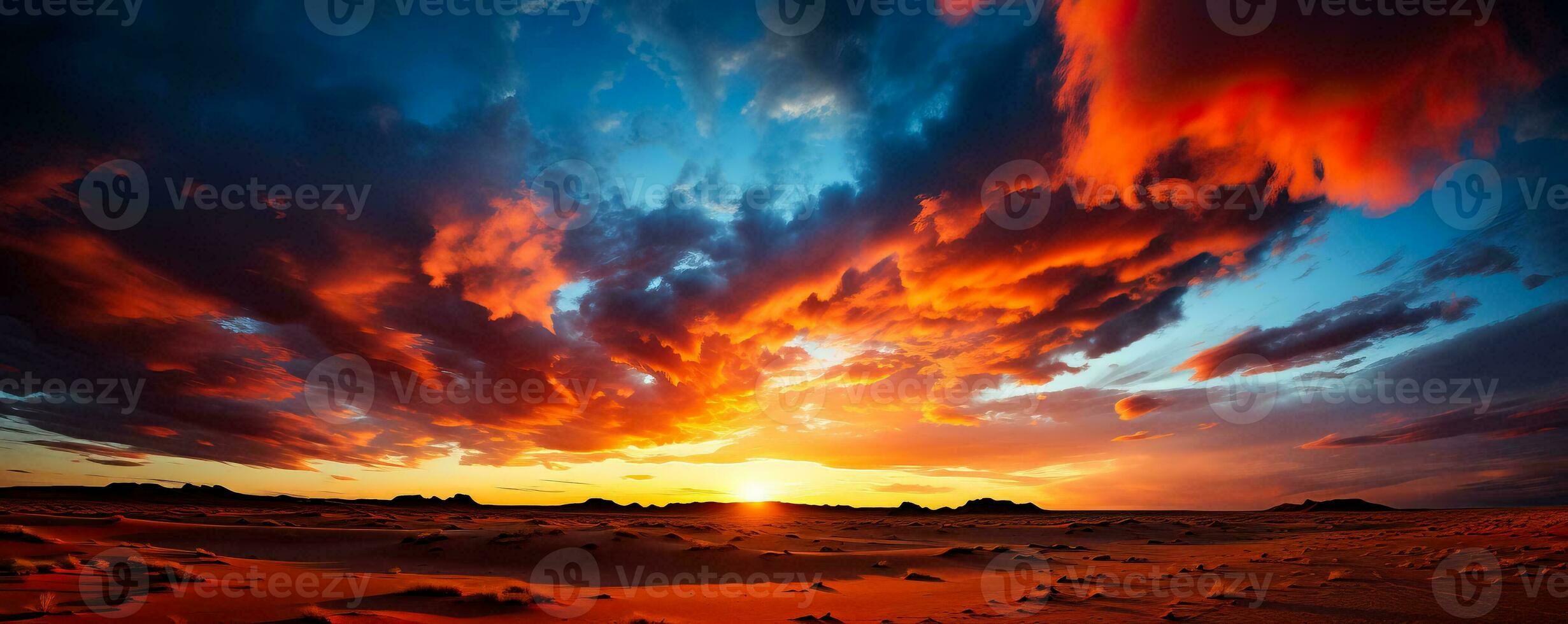 Vibrant rainbow-hued clouds hang majestically over the vast golden desert creating a breathtaking masterpiece in the sky photo