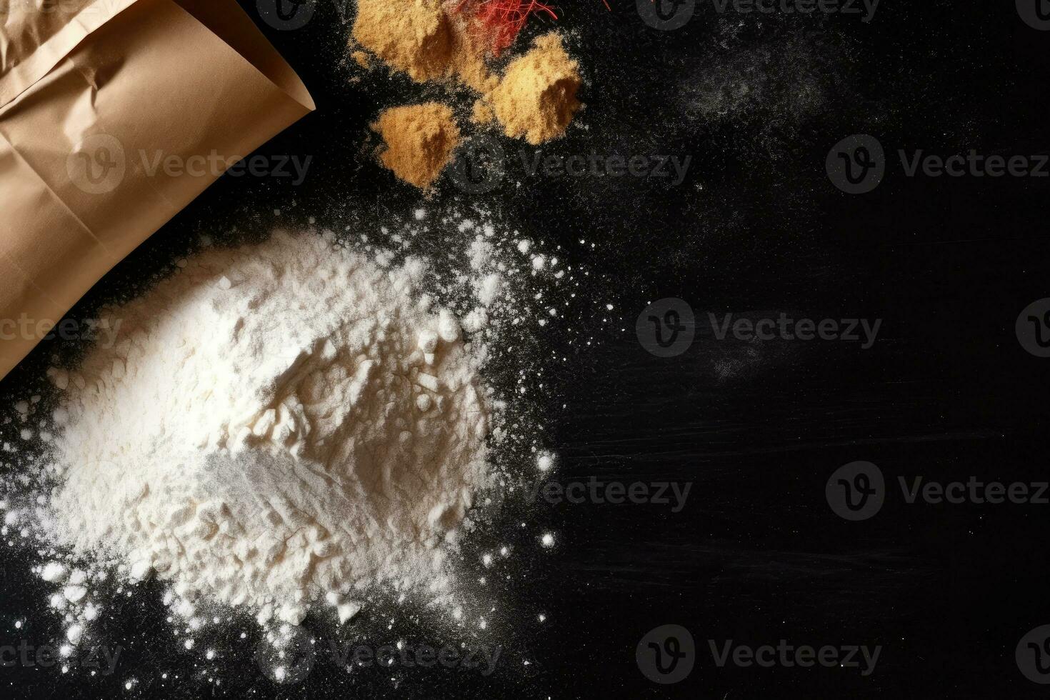 Grain sprinkled flour sits on a table next to a bowl of wheat and a bowl of oats photo