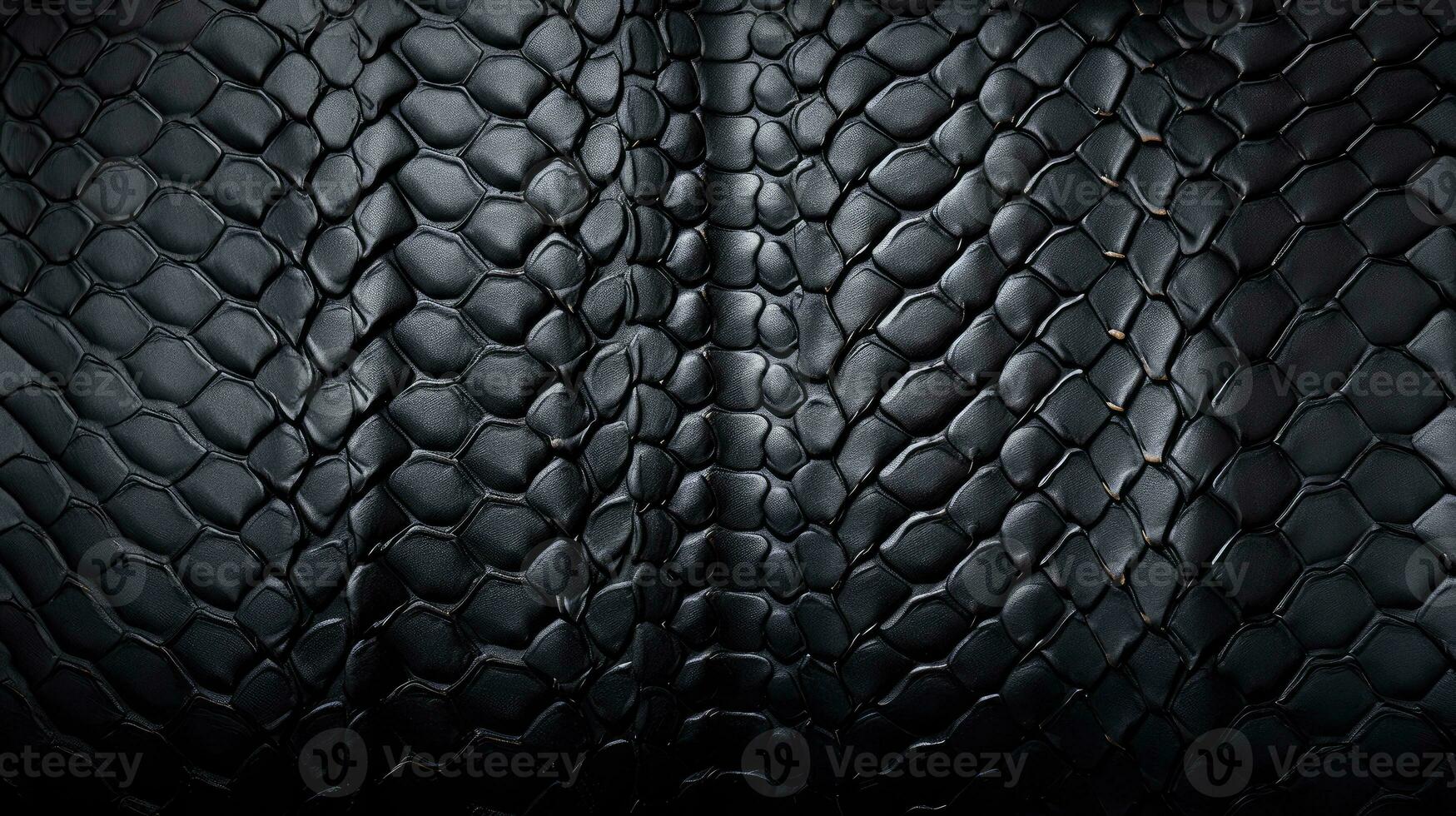 Background texture black leather reptiles. Snake skin or dragon scale texture photo