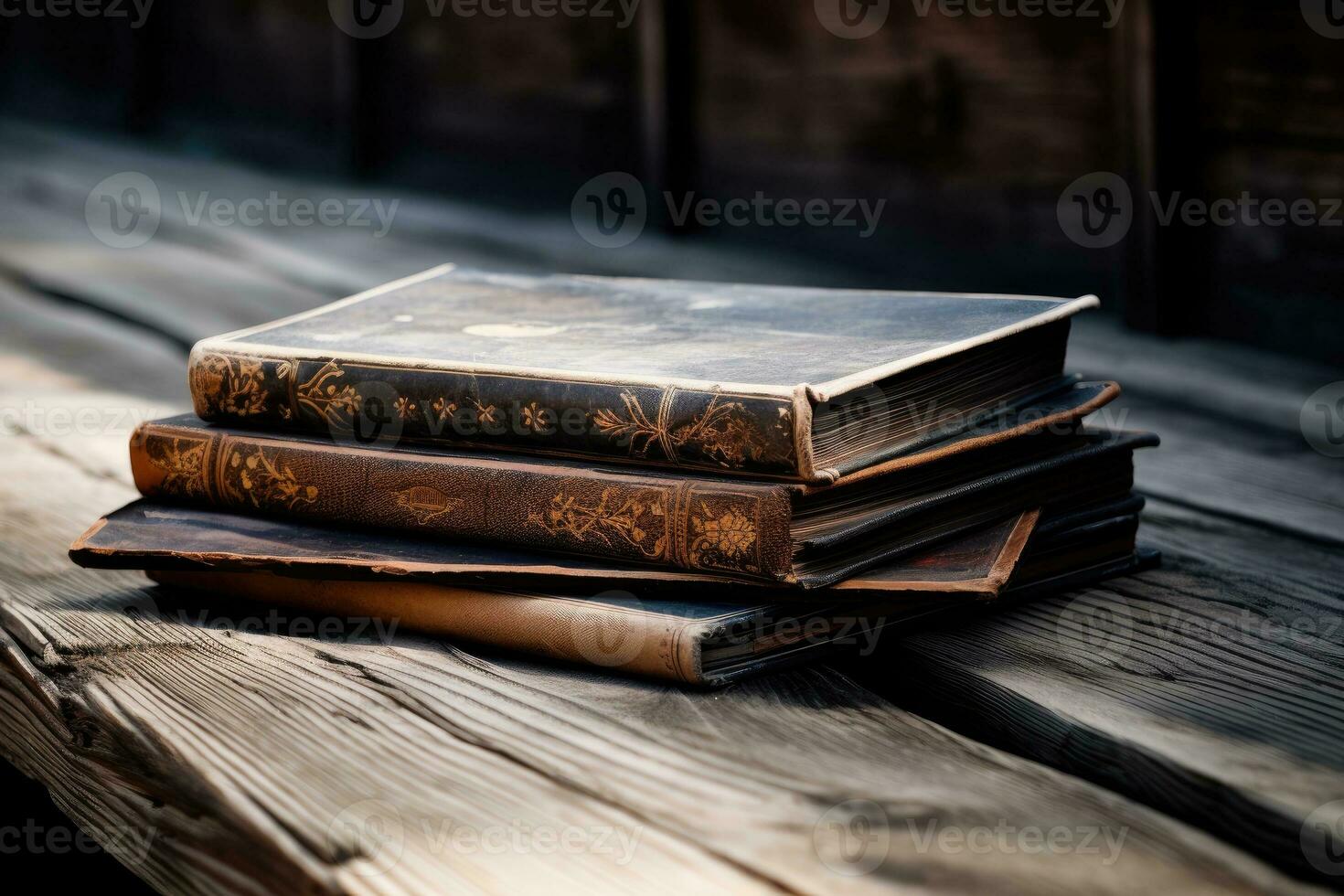 Old books on a wooden table. The concept of education photo