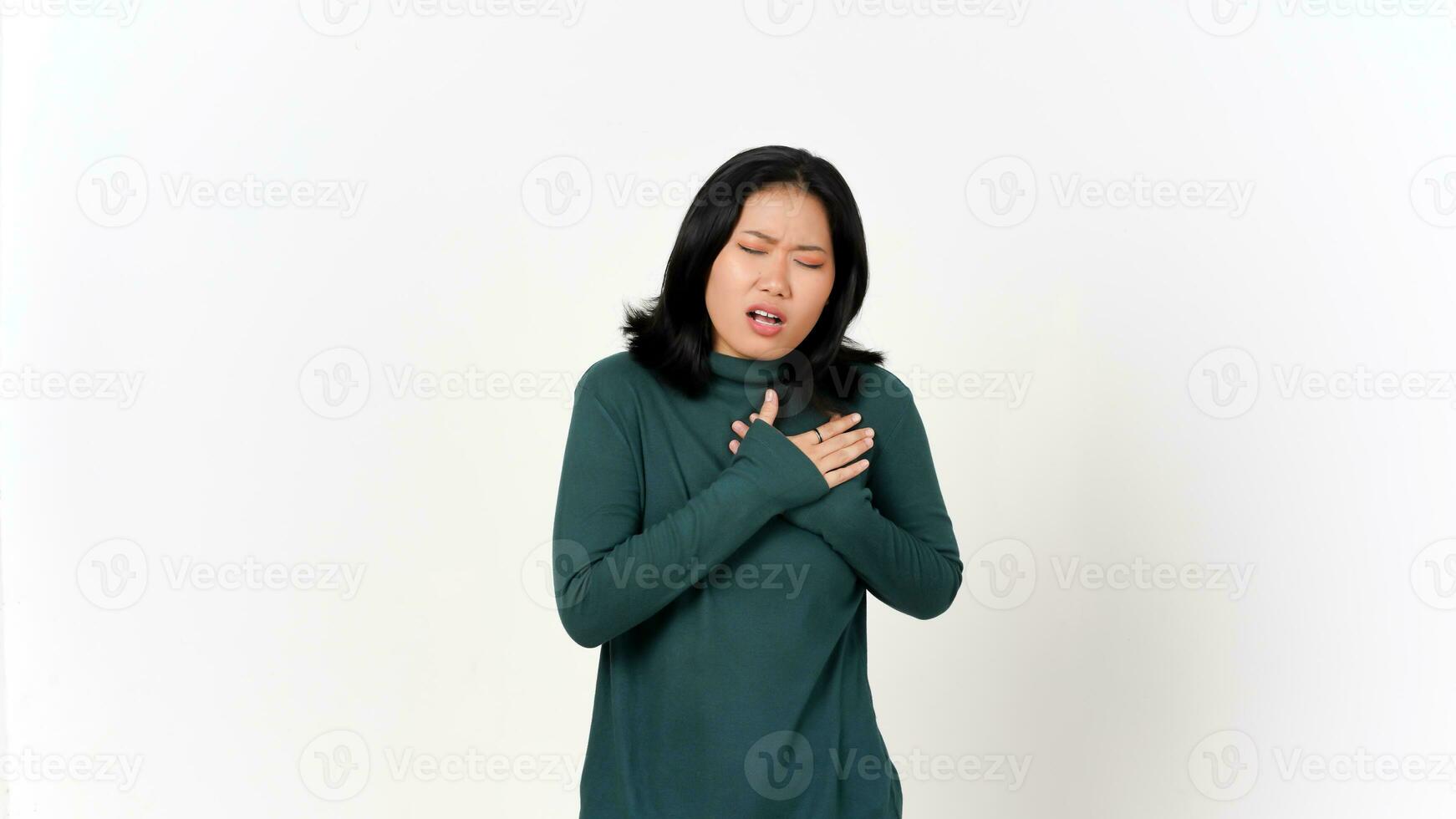 Hand on Chest Feeling Pain On Chest Of Beautiful Asian Woman Isolated On White Background photo
