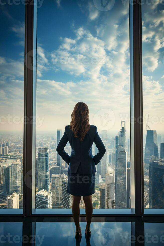 Backshot of a female leader against a panoramic window and expansive cityscape with ample copyspace AI Generative photo