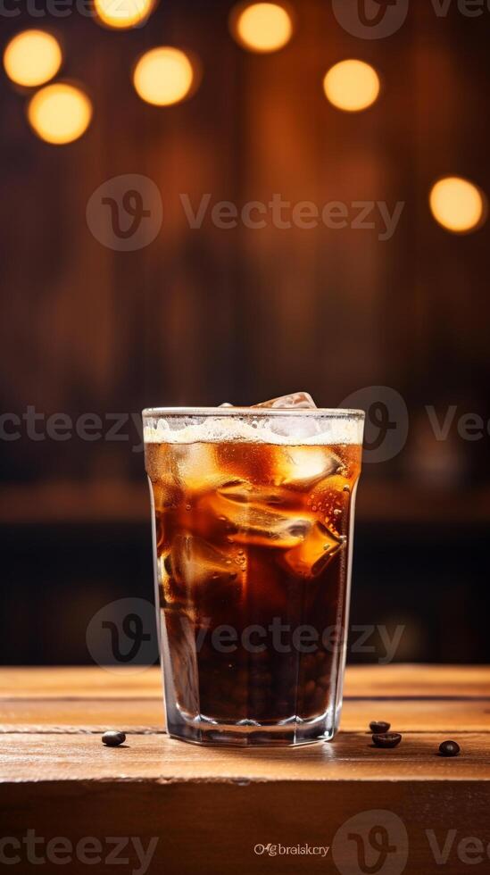 Refreshing Cold Brew Coffee in Clear Glass on a Vintage Wooden Table with Copy Space photo