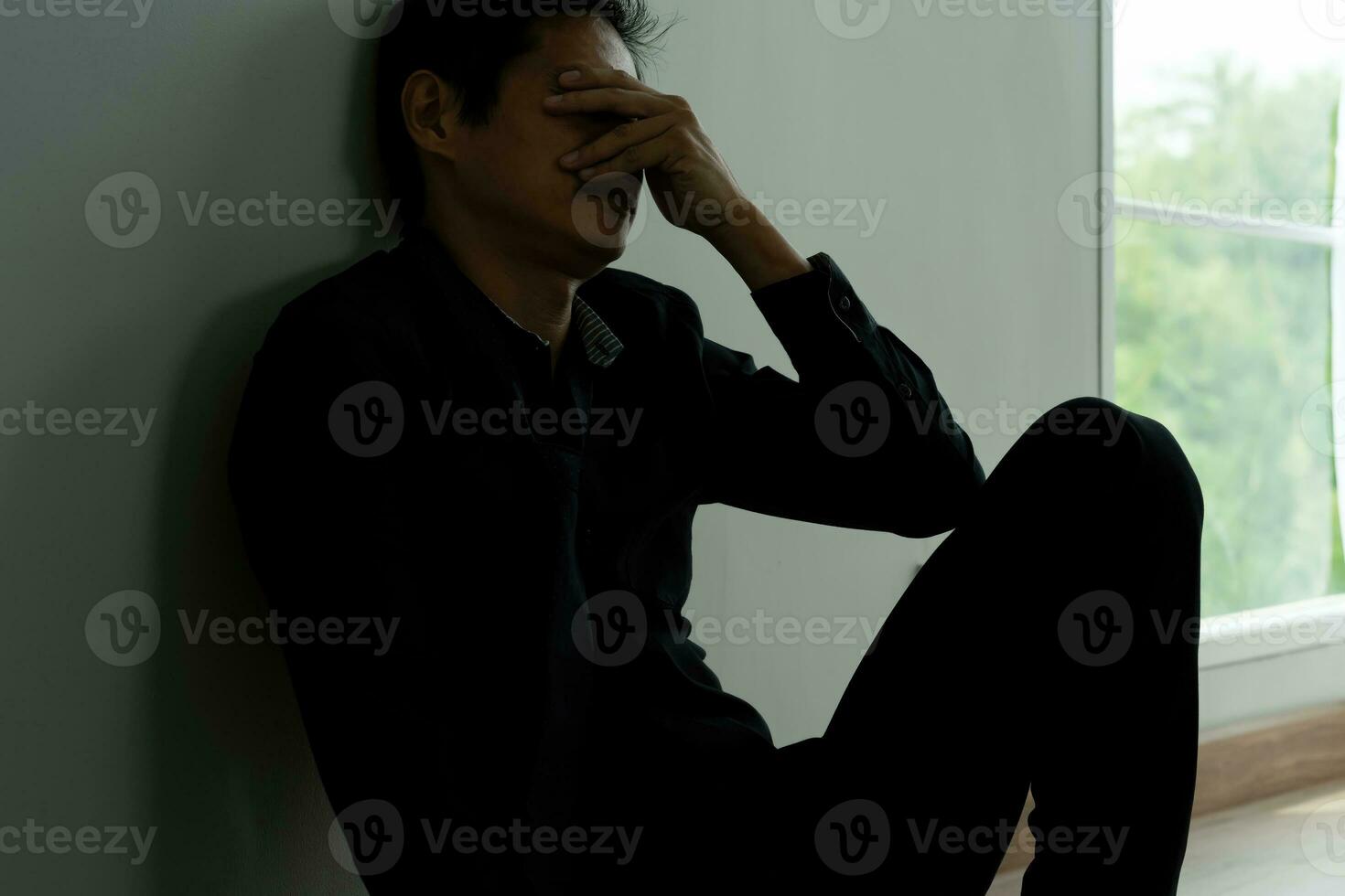 Depression and mental illness. Asian man disappoint, sad after receive bad news. Stressed boy confused with unhappy problem, arguing with girlfriend, cry and worry about unexpected work, down economy. photo