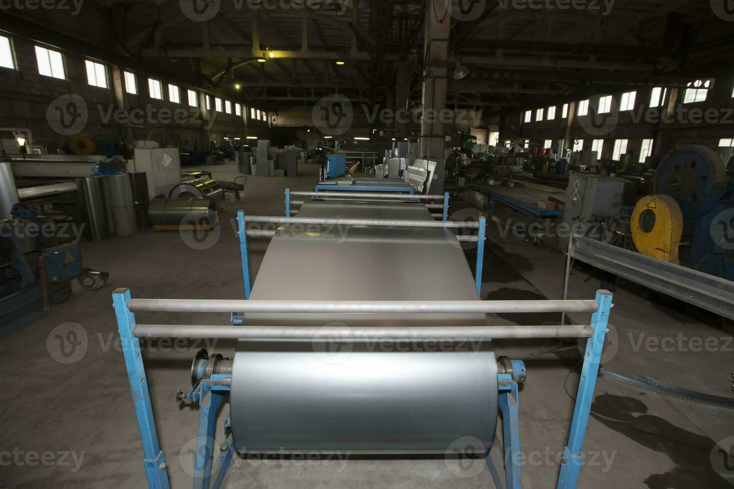 Metal stainless ventilation pipes at a metallurgical plant. Rolled metal. photo