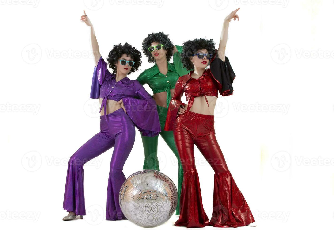 Group of girls amazed in disco style, with disco ball, halloween party, on white background. photo