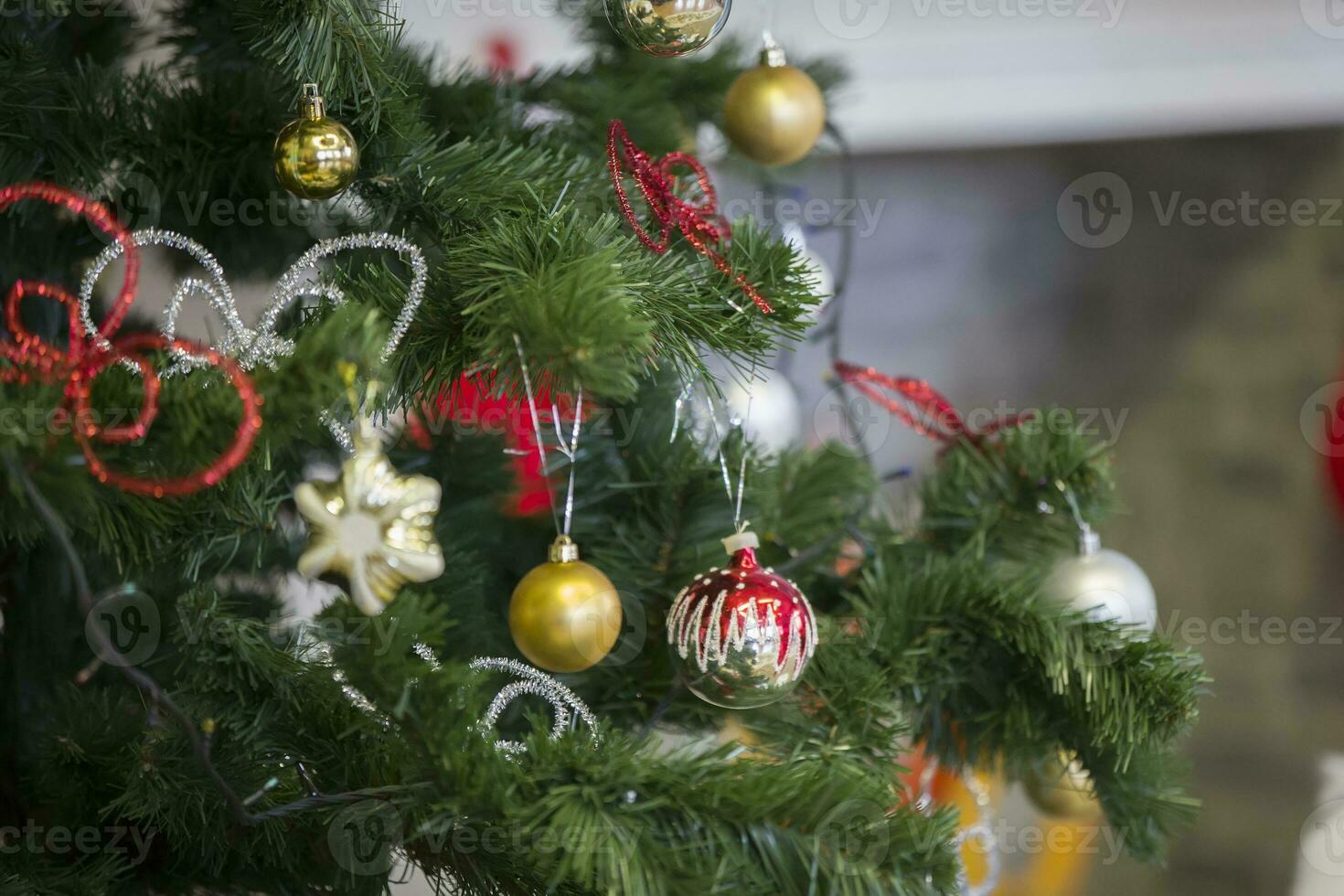 Fragment of a Christmas tree with toys.Christmas background photo