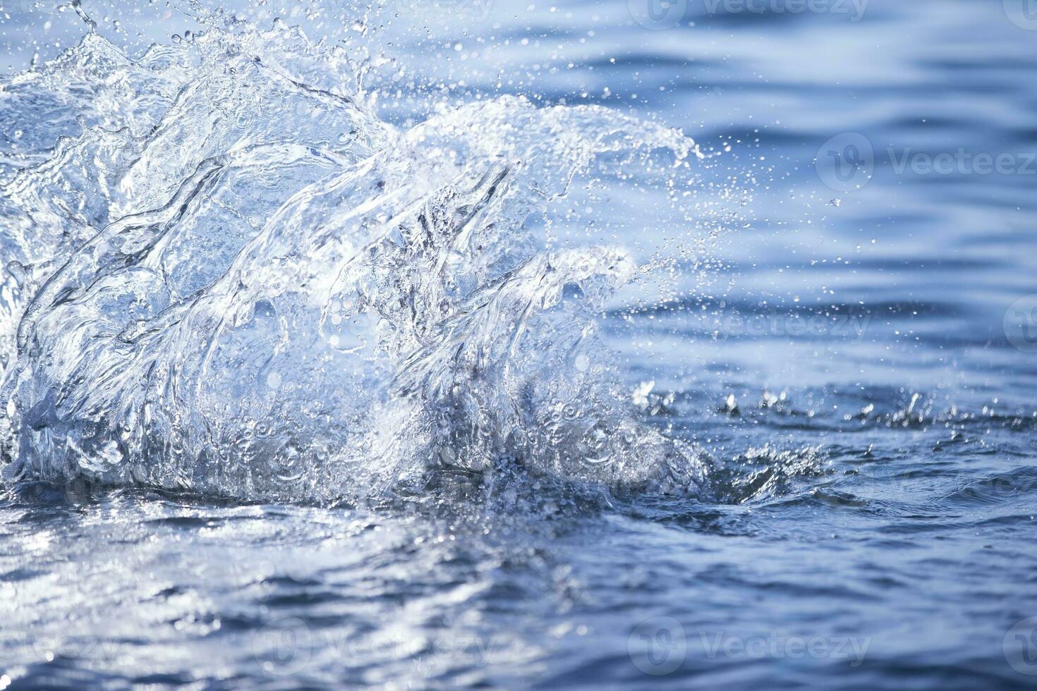 Blue splashes of sea water. Texture blue water. photo