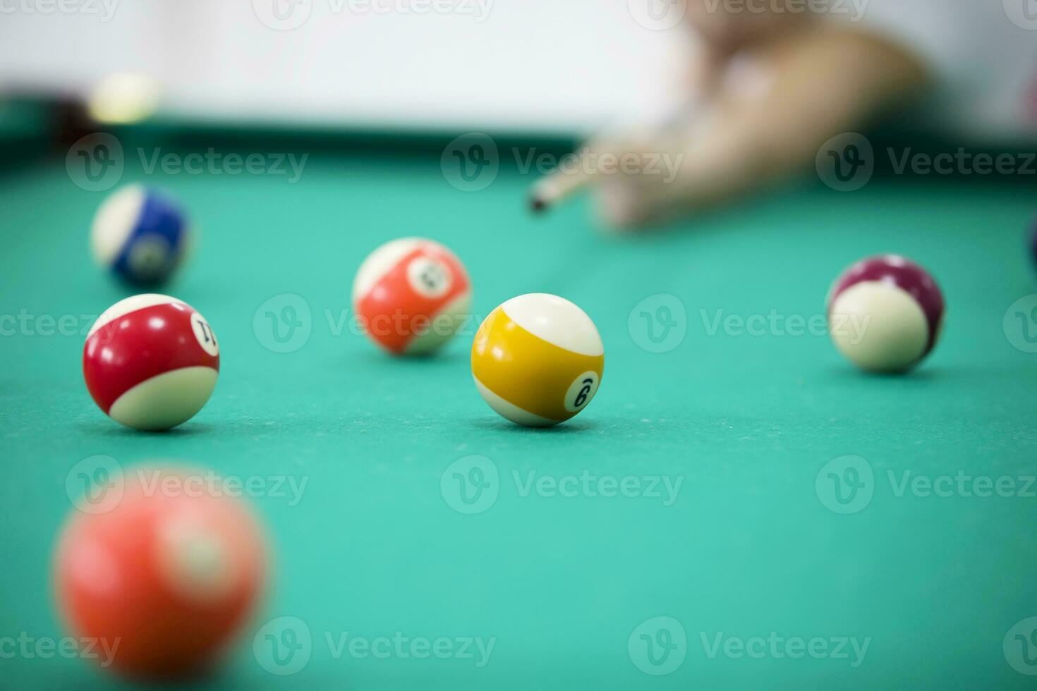 Billiard balls on a green background. Billiards game photo