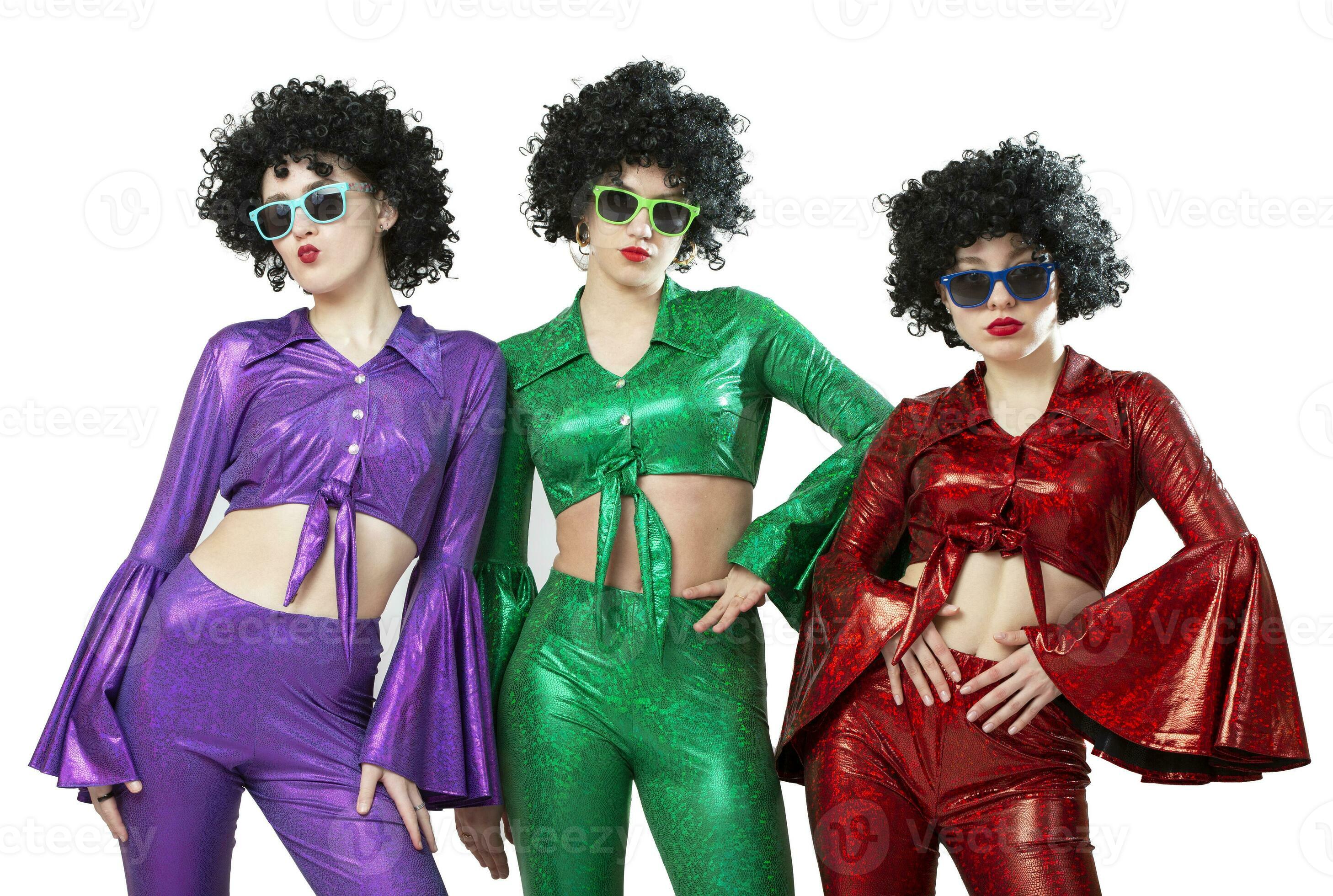 A group of disco girls in African American wigs and colorful