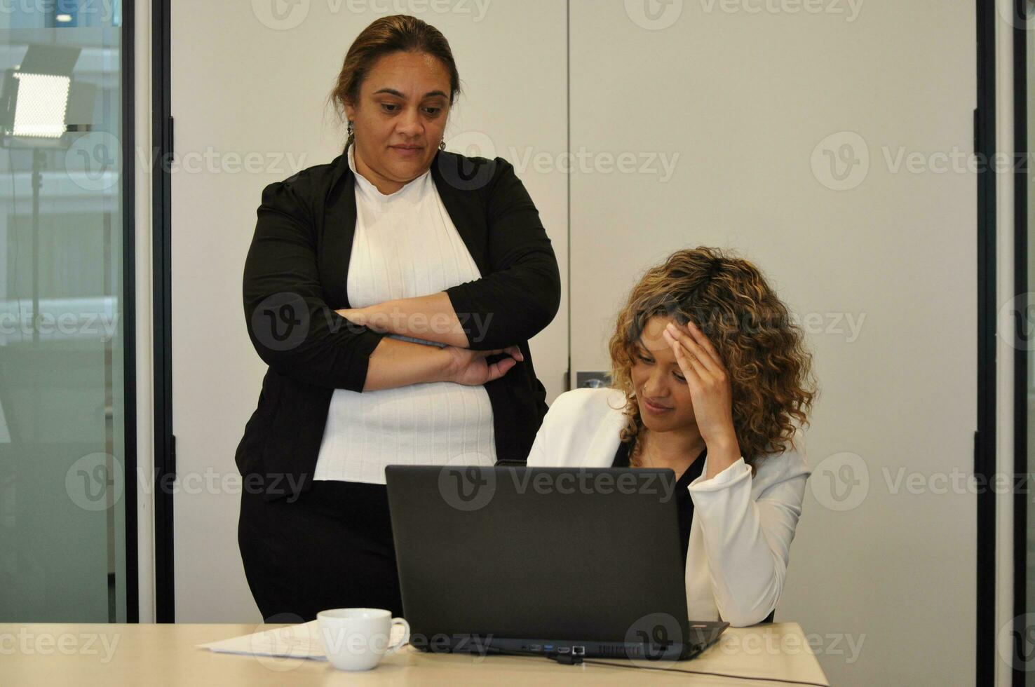 Maori, Pacific Islanders in business setting for meeting and coaching photo