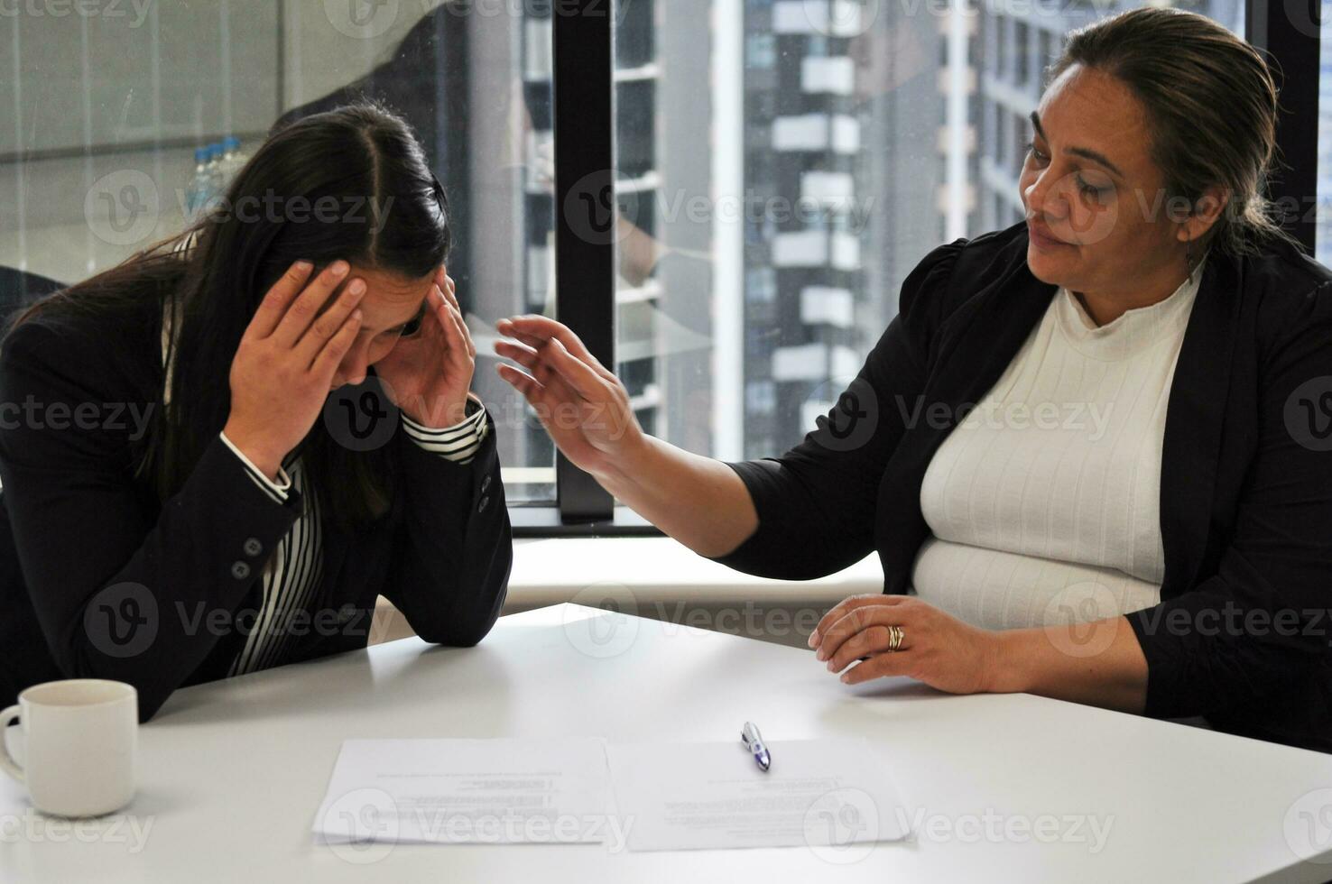 Maori, Pacific Islanders in business setting for meeting and coaching photo