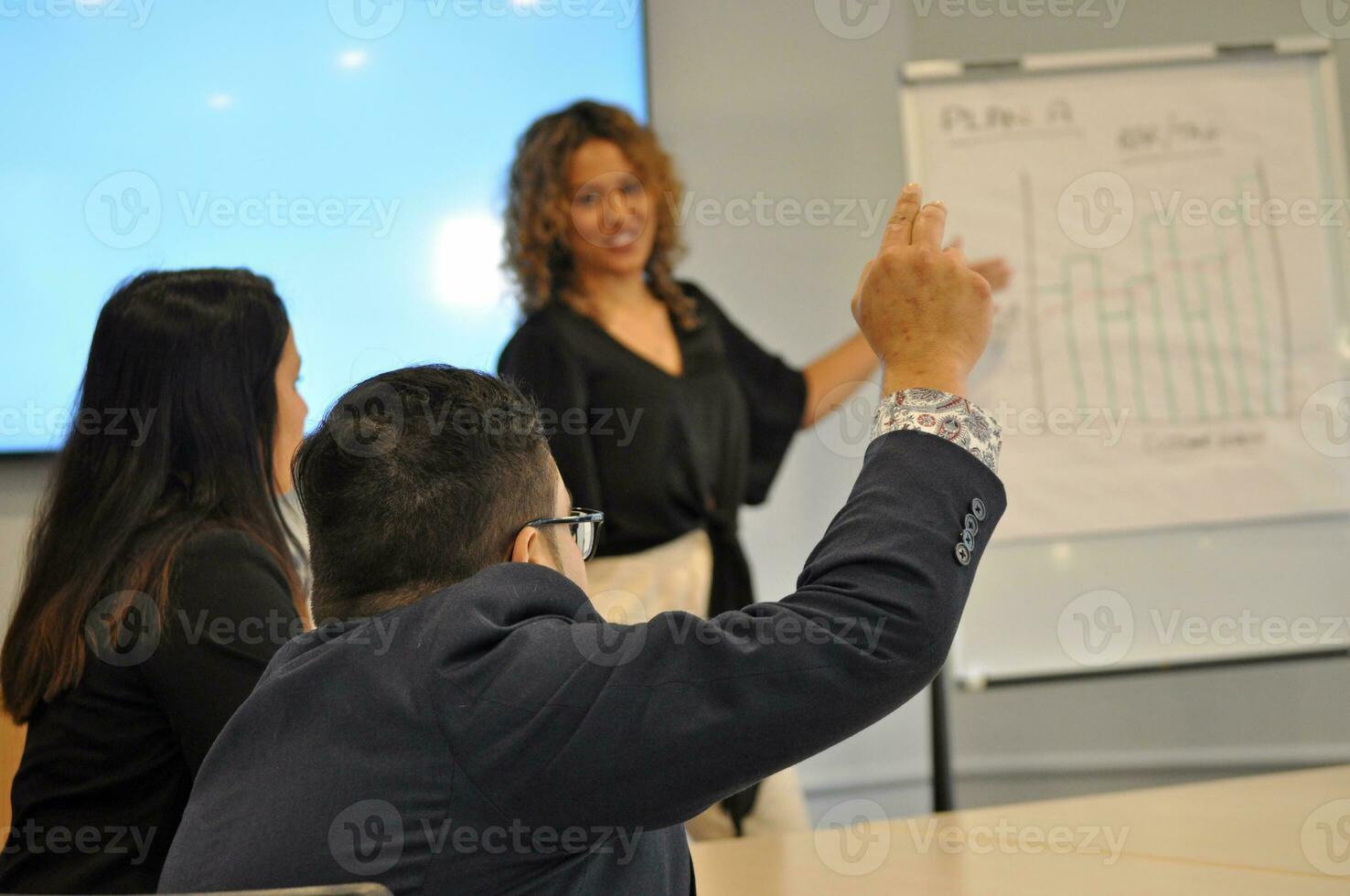 Maori, Pacific Islanders in business setting for meeting and coaching photo