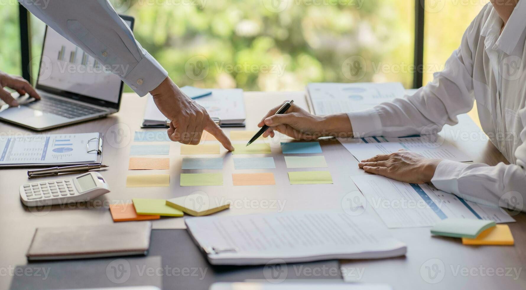 Business People brainstorming Meeting Design Ideas use post it notes to share idea professional investor start up project business brainstorming planning in office photo