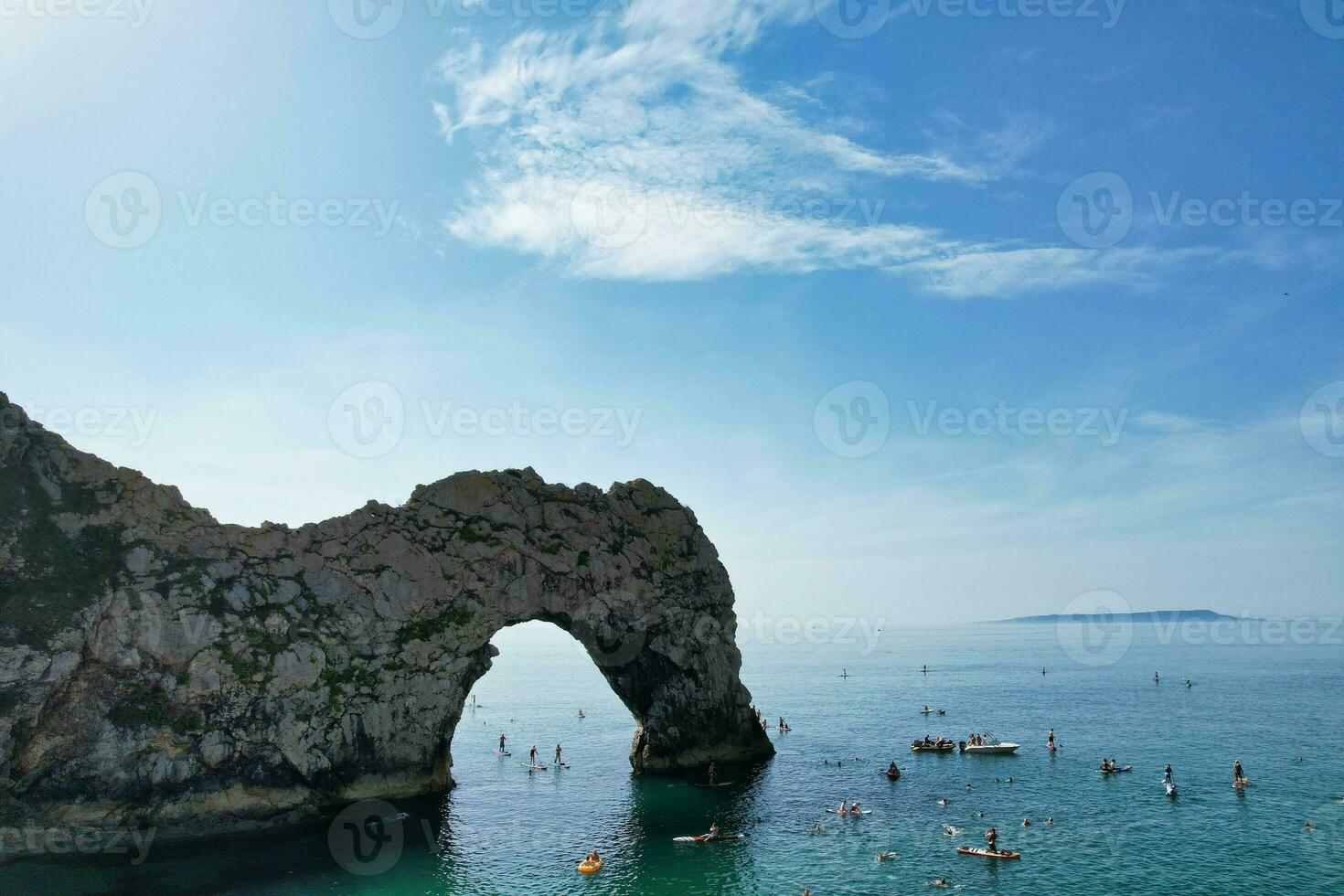 Most Beautiful High Angle View of British Landscape and Sea View of Durdle Door Beach of England Great Britain, UK. Image Was captured with Drone's camera on September 9th, 2023 photo