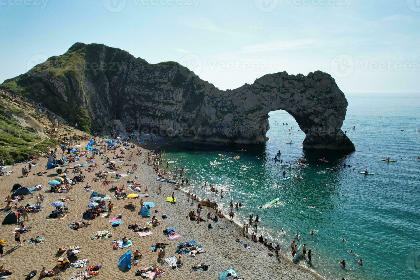 Most Beautiful High Angle View of British Landscape and Sea View of Durdle Door Beach of England Great Britain, UK. Image Was captured with Drone's camera on September 9th, 2023 photo