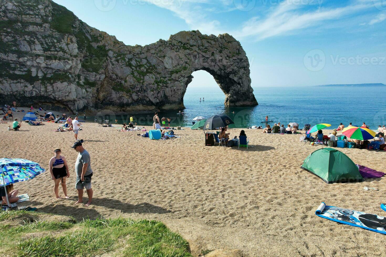 Most Beautiful High Angle View of British Landscape and Sea View of Durdle Door Beach of England Great Britain, UK. Image Was captured with Drone's camera on September 9th, 2023 photo