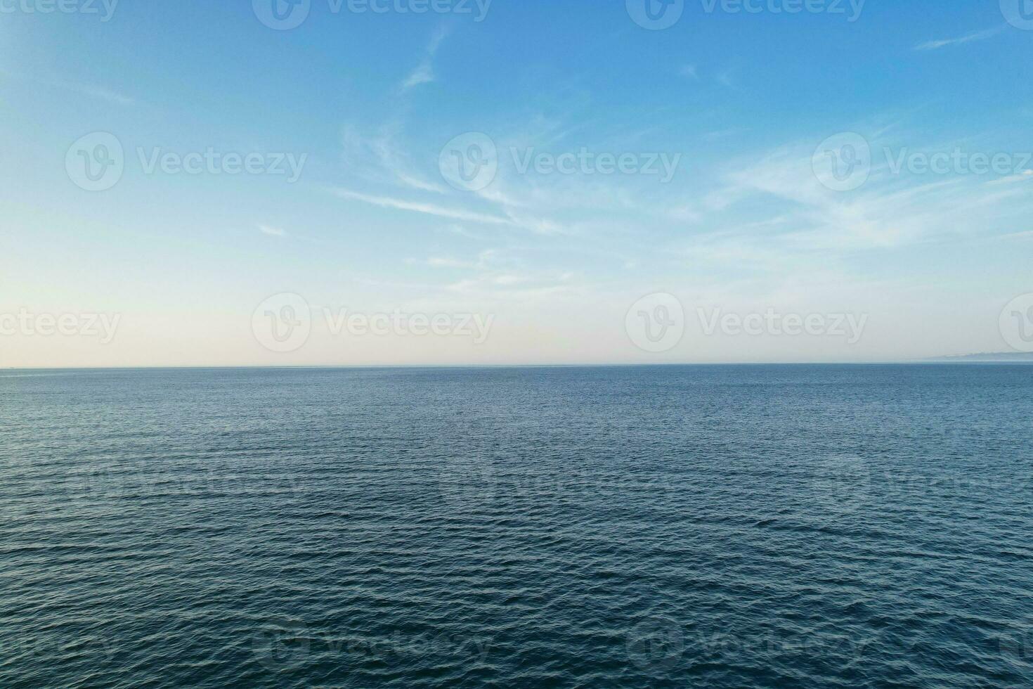 Most Beautiful View of British Landscape and Sea View of Durdle Door Beach of England Great Britain, UK. Image Was captured with Drone's camera on September 9th, 2023 photo