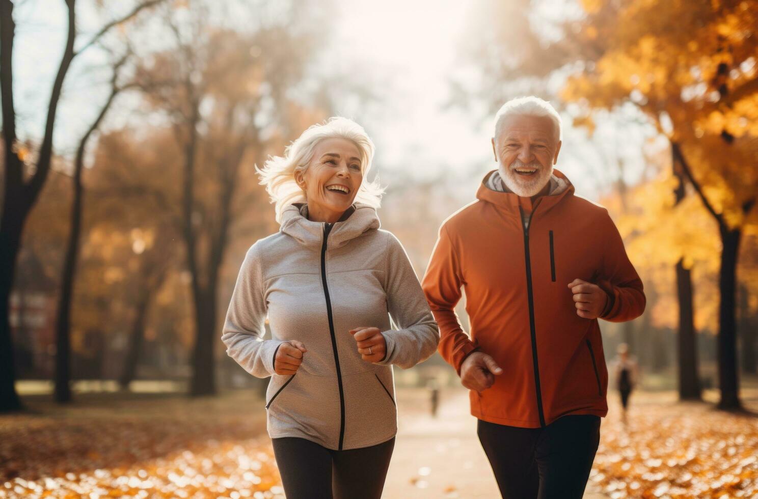 An older couple is jogging in an open field photo