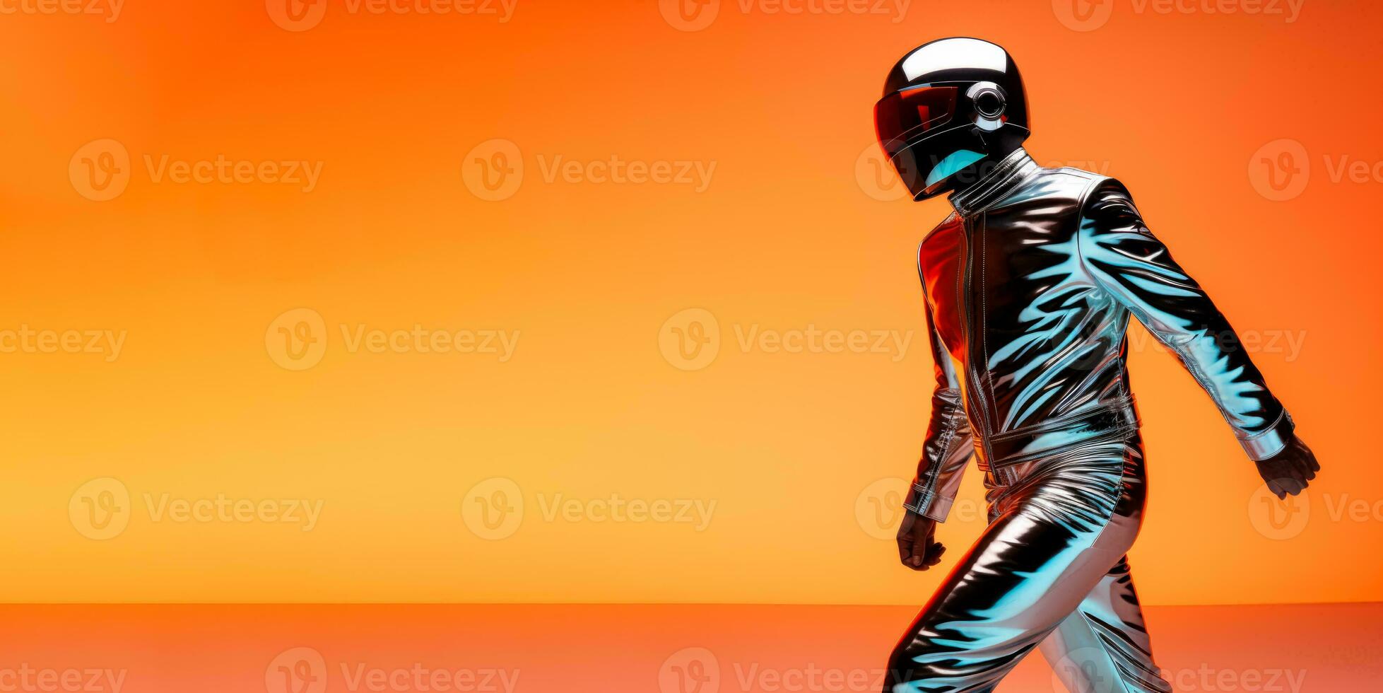 Futuristic model in a sleek chrome jumpsuit isolated on a vibrant gradient background photo