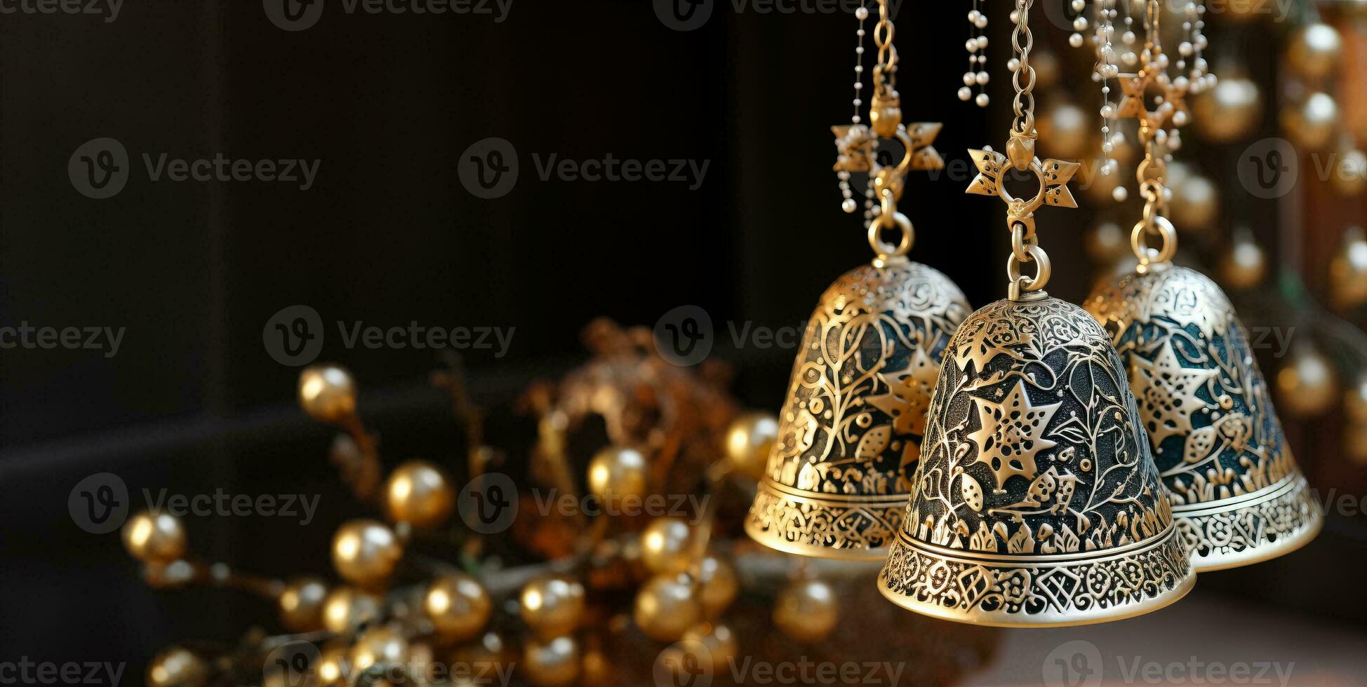 A close-up of bell ornaments with intricate low relief designs on shimmering golden glitter backgrounds adding a touch of elegance photo