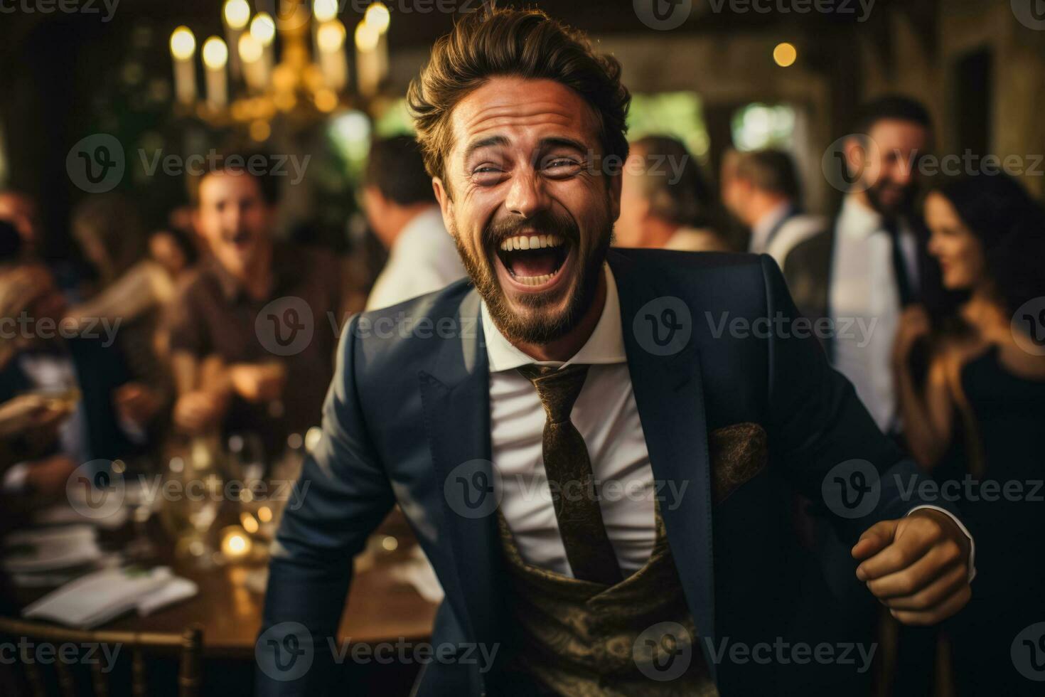 Guests erupt in candid laughter amidst the festive vibrancy of a wedding reception photo