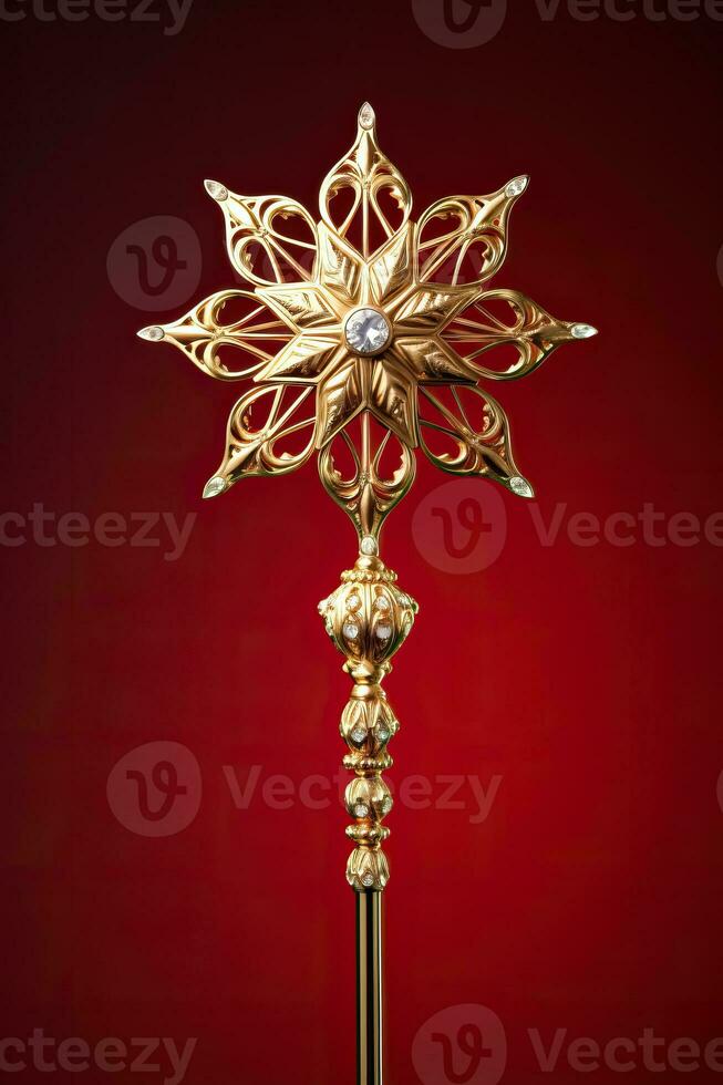 Victorian style Christmas tree topper a golden star gleaming with sparkle isolated on a holiday red gradient background photo
