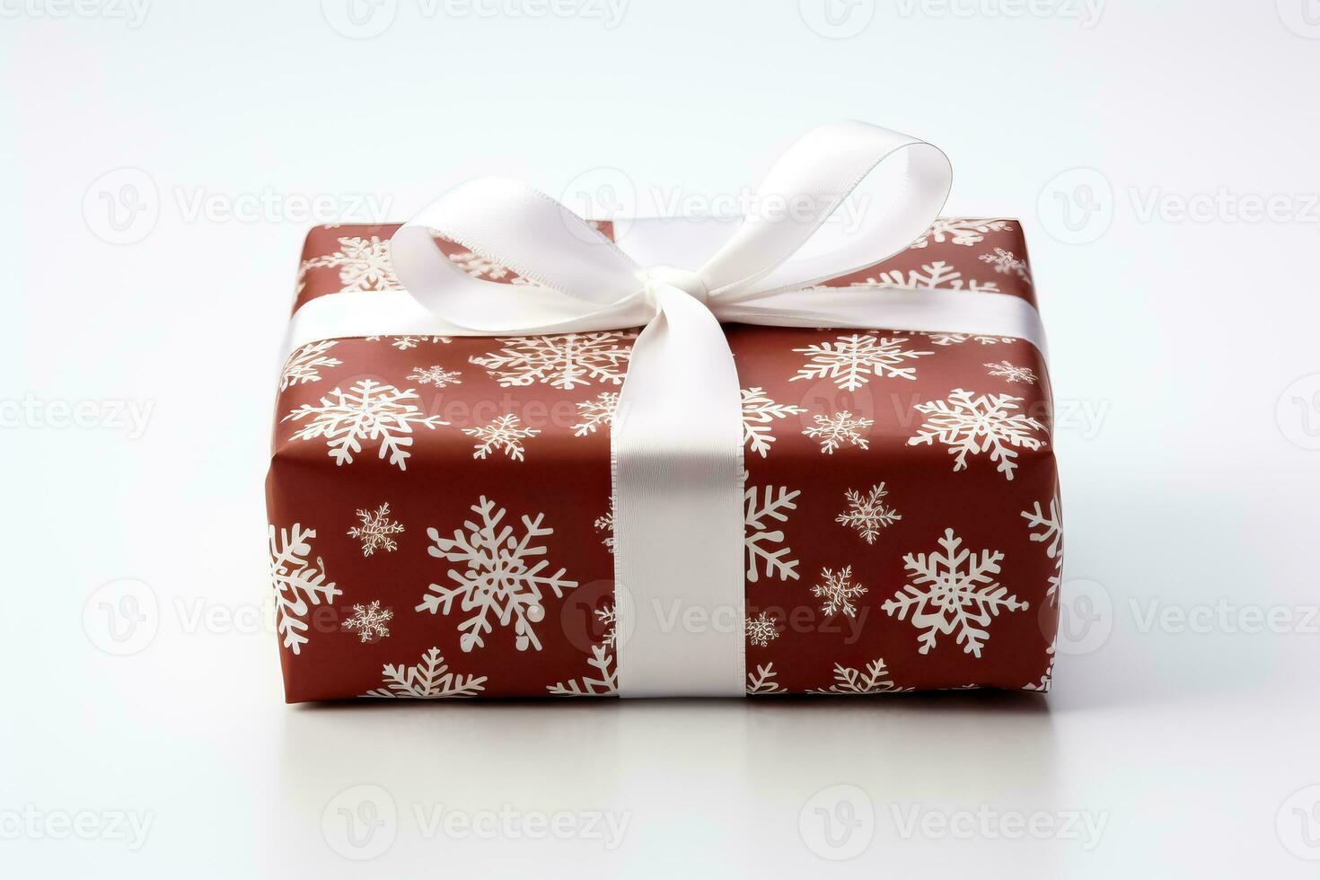 Vintage snowflake-patterned Christmas wrapping paper neatly folded isolated on a snow-white gradient background photo