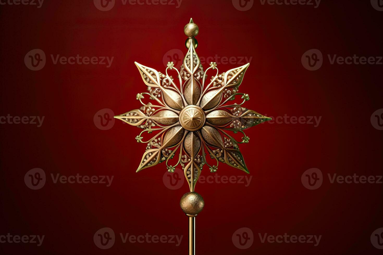 Victorian style Christmas tree topper a golden star gleaming with sparkle isolated on a holiday red gradient background photo