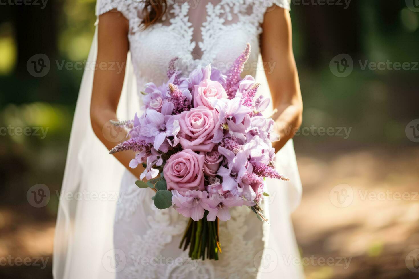 Close-up of a beautiful brides stunning floral wedding bouquet details photo