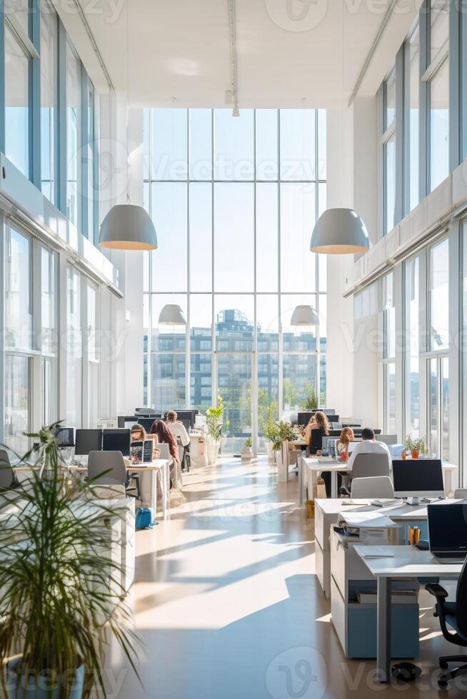 Vibrant open space office filled with natural light and bustling with productivity photo