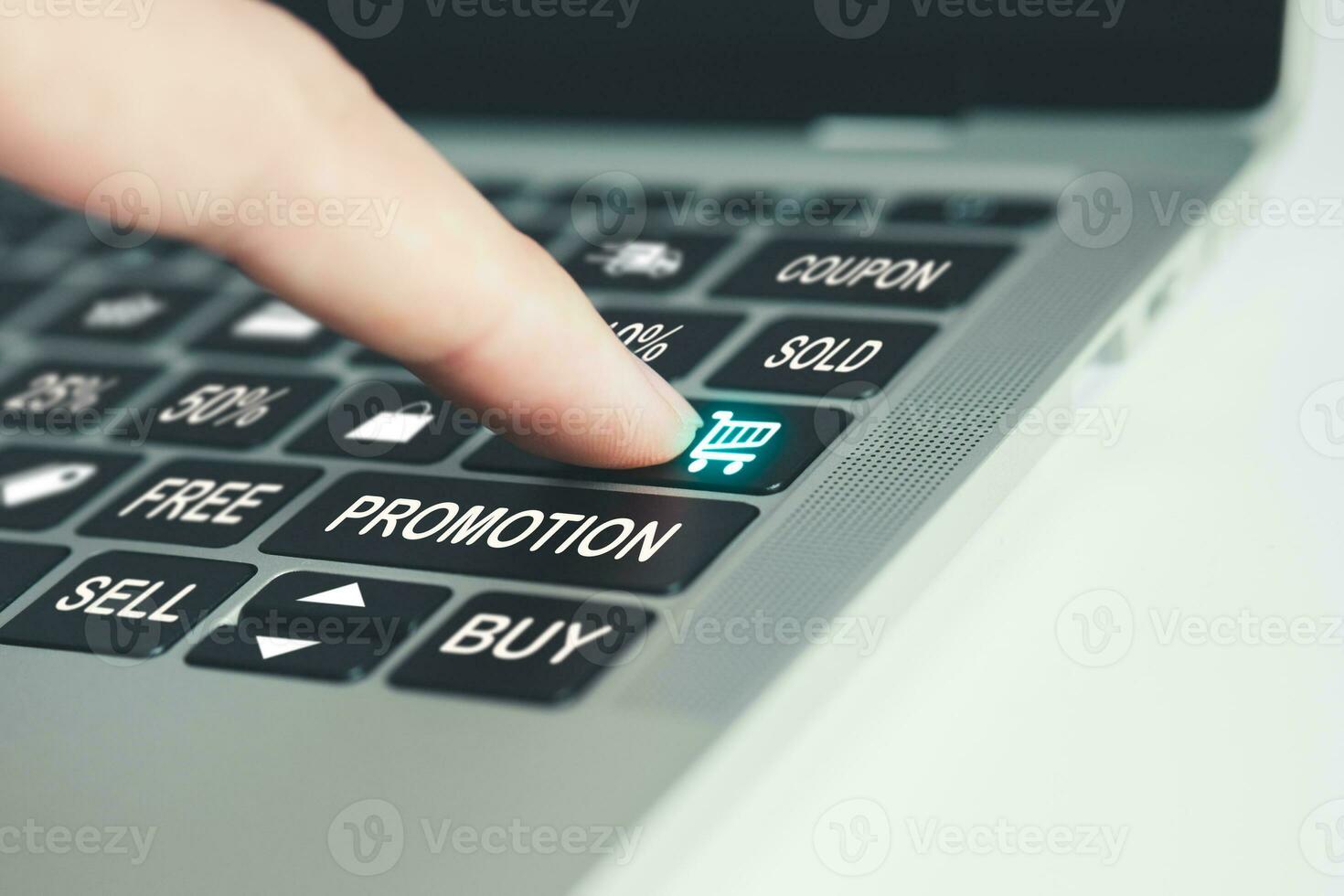 Businessman pointing labtop button with shopping text and icons. Business, marketing and shopping online concept. photo