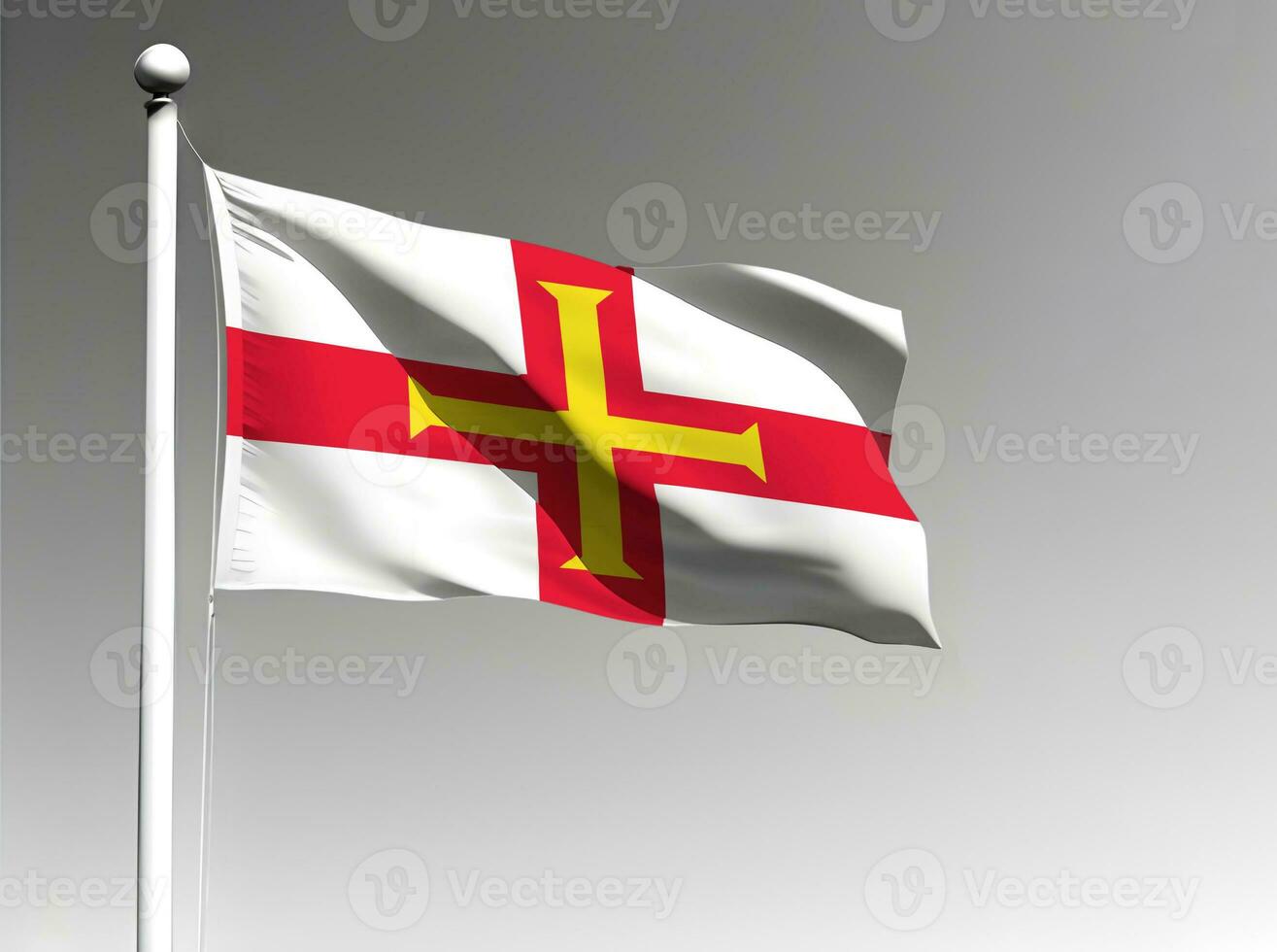 Guernsey national flag waving on gray background photo