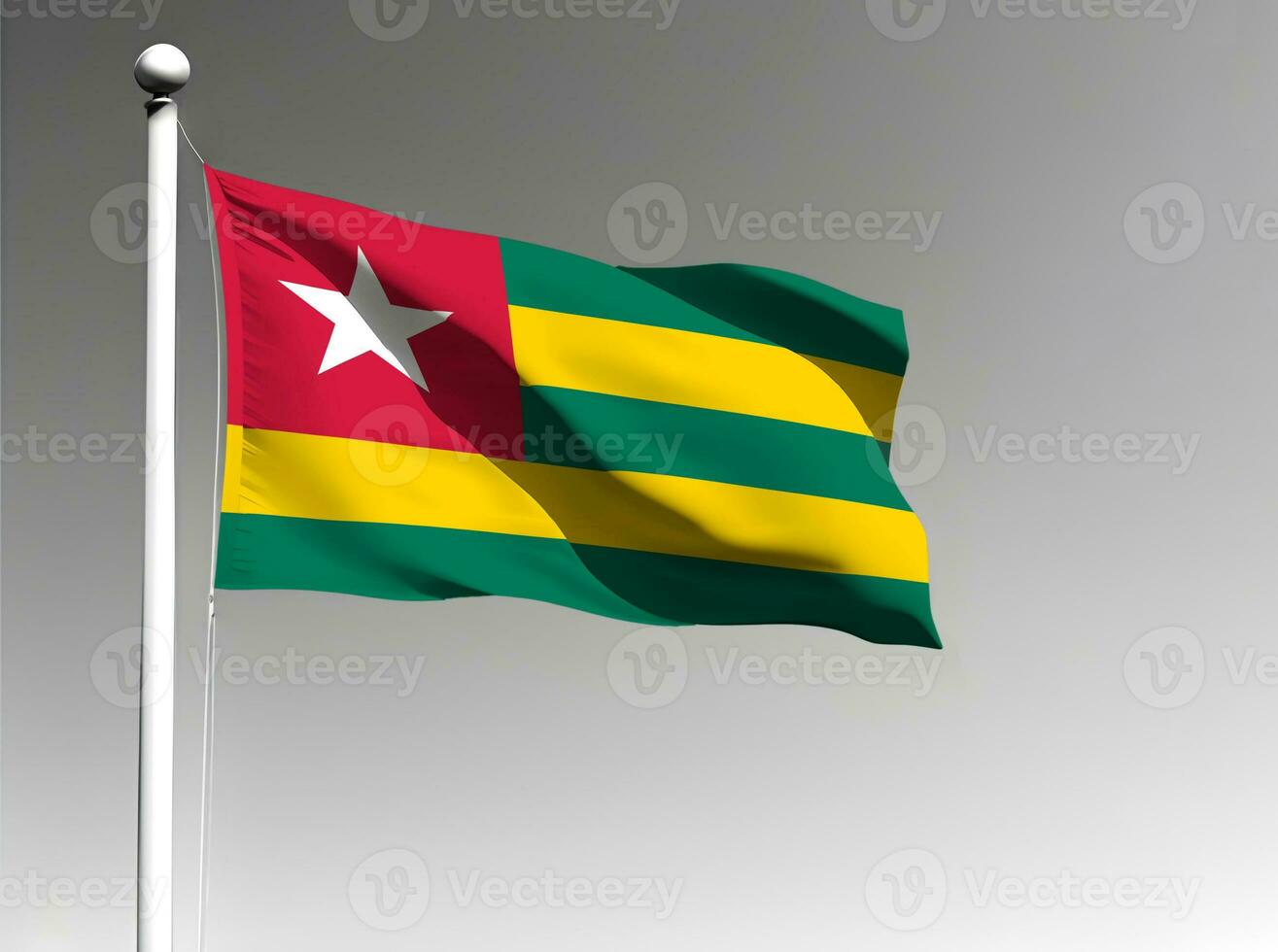Togo national flag waving on gray background photo