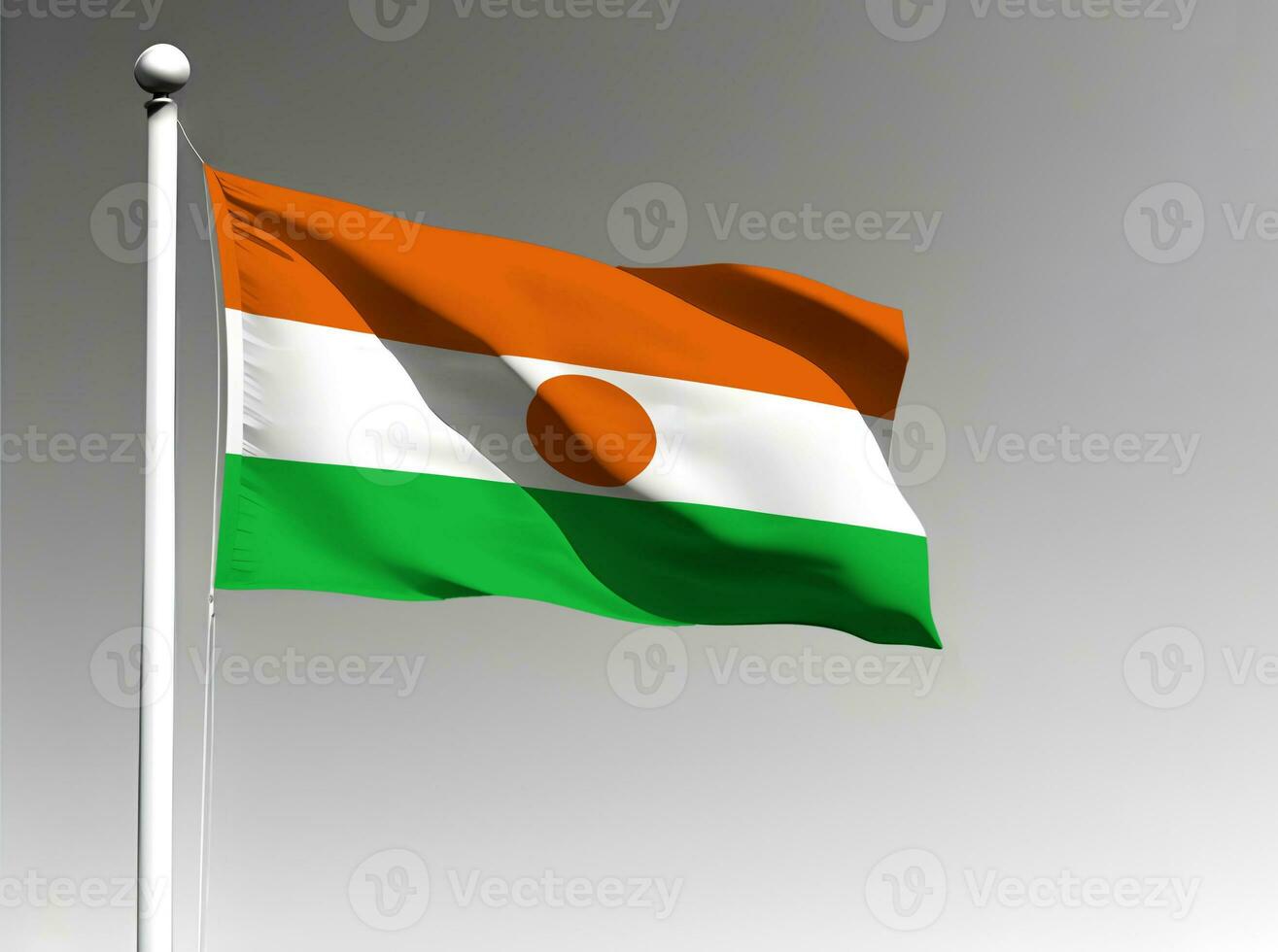 Niger national flag waving on gray background photo