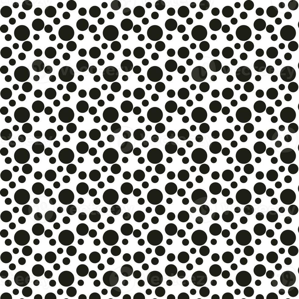 black dots pattern on white background ramdon size photo