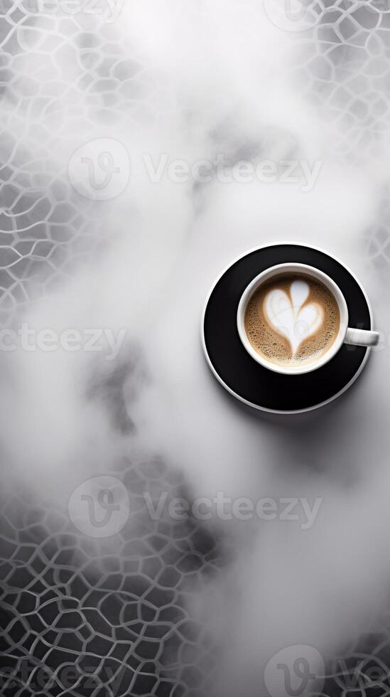 Aerial View of Steaming Coffee Cup on Geometrically Patterned Surface with Ample Copy Space photo