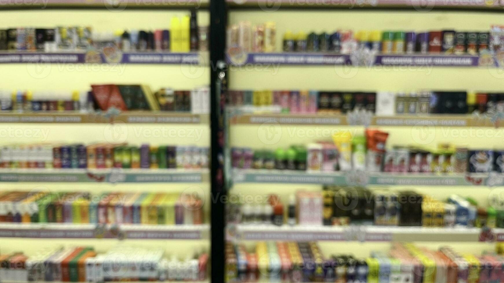 Abstract blurred of products showcase in a store, with bokeh light background. photo